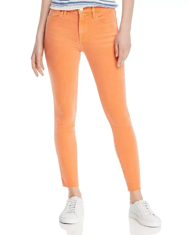 Le High Rise Frayed Raw Edge Skinny Jeans In Orange